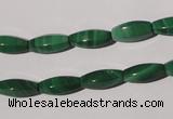 CMN224 15.5 inches 5*12mm faceted rice natural malachite beads