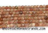 CMS2258 15 inches 6mm faceted round orange moonstone beads