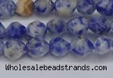 CNG6250 15.5 inches 6mm faceted nuggets blue spot stone beads