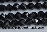 CNG7350 15.5 inches 6mm faceted nuggets Black agate beads