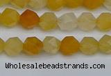 CNG7355 15.5 inches 6mm faceted nuggets yellow jade beads