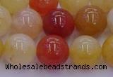 CRO1165 15.5 inches 14mm round golden silk jade beads wholesale