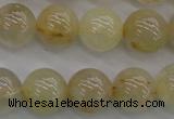 CRU583 15.5 inches 10mm round golden rutilated quartz beads