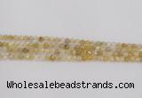 CRU666 15.5 inches 4mm faceted round golden rutilated quartz beads