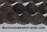 CSQ533 15.5 inches 10mm faceted nuggets matte smoky quartz beads