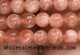 CSS300 15.5 inches 4mm round golden sunstone gemstone beads