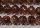 CSS553 15.5 inches 7mm round natural golden sunstone beads