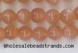 CSS703 15.5 inches 4mm round natural golden sunstone beads