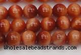 CTE1661 15.5 inches 6mm round sun orange tiger eye beads