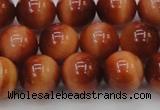 CTE1664 15.5 inches 12mm round sun orange tiger eye beads