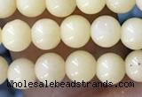 CTG1596 15.5 inches 4mm round yellow jade beads wholesale