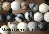 CTG3563 15.5 inches 4mm faceted round black picasso jasper beads