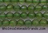 CTG512 15.5 inches 4mm faceted round tiny green apatite beads