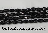 CTO115 15.5 inches 4*6mm faceted rice black tourmaline beads