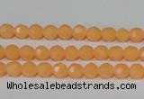 CTU2539 15.5 inches 4mm faceted round synthetic turquoise beads