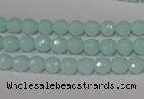 CTU2572 15.5 inches 6mm faceted round synthetic turquoise beads