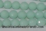 CTU2574 15.5 inches 10mm faceted round synthetic turquoise beads