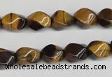 CTW151 15.5 inches 8*11mm twisted rice yellow tiger eye beads