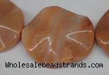 CTW312 15.5 inches 28*32mm wavy oval pink aventurine jade beads