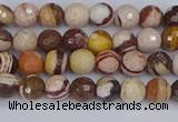 CZJ278 15.5 inches 4mm faceted round zebra jasper beads