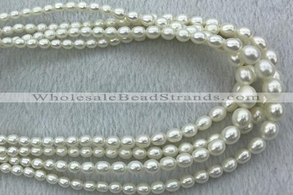 FWP212 15 inches 4mm - 9mm rice white freshwater pearl strands