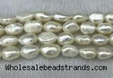 FWP304 15 inches 11mm - 12mm baroque white freshwater pearl strands