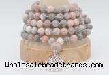 GMN1262 Hand-knotted 8mm, 10mm pink zebra jasper 108 beads mala necklaces with charm