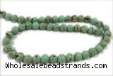 TURQ26 15 inches 4mm round synthetic turquoise with shelled beads